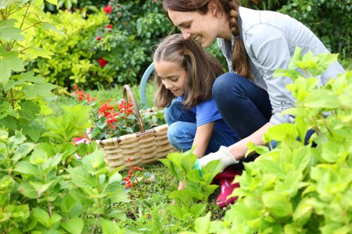 Professional gardening team enhancing a Wanstead garden